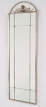 Swedish Grace, a pewter framed wall mirror, 1920s-1930s.