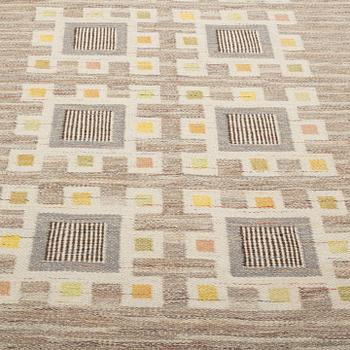 A CARPET, flat weave, around  214 x 121 cm.