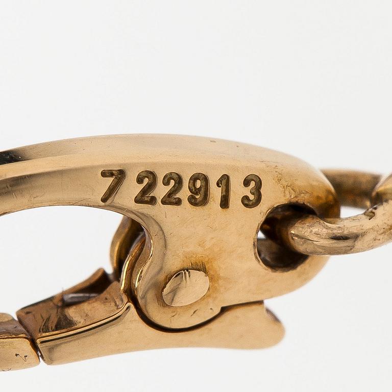 Cartier, an 18K gold letter pendant/charm.