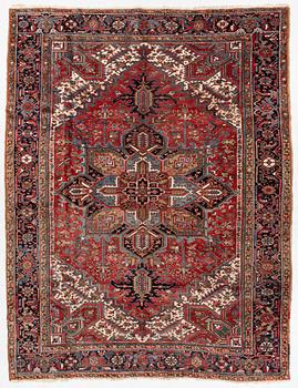 A semi-antique Heris carpet, west persia c. 322 x 252 cm.