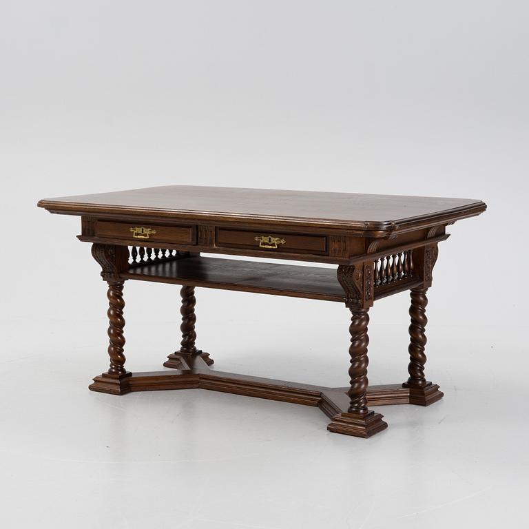 A writing desk / library table, circa 1900.
