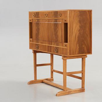 Josef Frank, a mahogany secretaire, model 1036, Svenskt Tenn Sweden, probably 1940-50's.