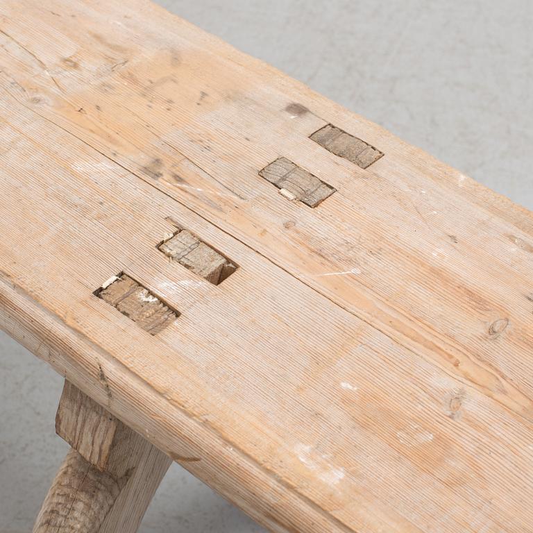 a 19th century wooden bench.