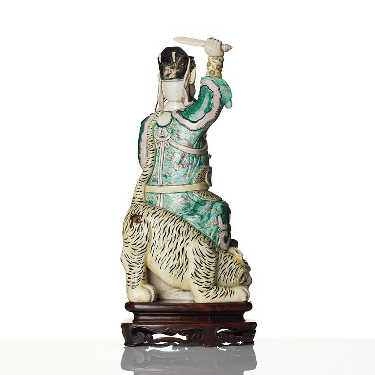 A famille verte bisquit figure of a warrior, Qing dynasty, 19th century.