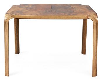 979. An Alvar Aalto mahogany and stained beech "Fan-leg table" by Artek, Finland.