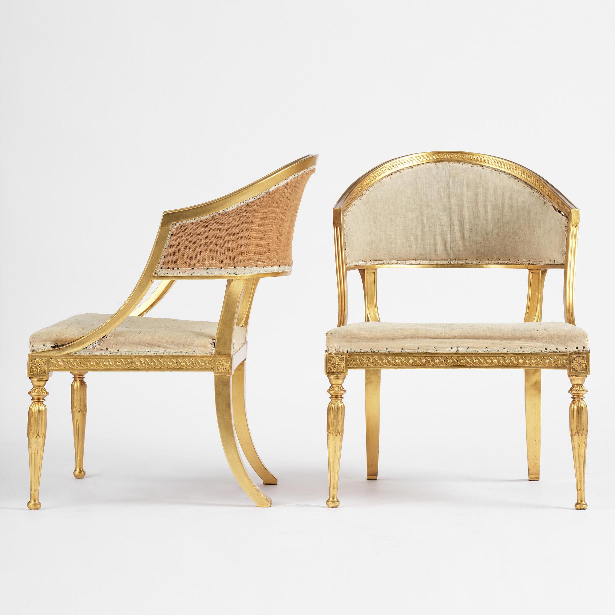 A pair of late Gustavian giltwood open-back armchairs, Stockholm, late 18th century.