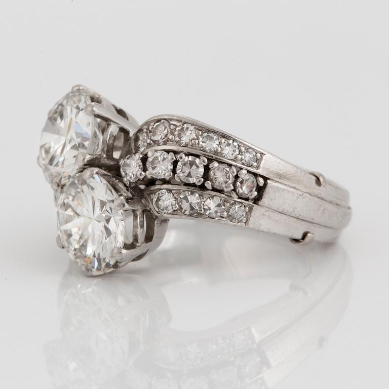 A WA Bolin platinum ring set with two round brilliant-cut diamonds with a total weight of ca 3.50 cts.