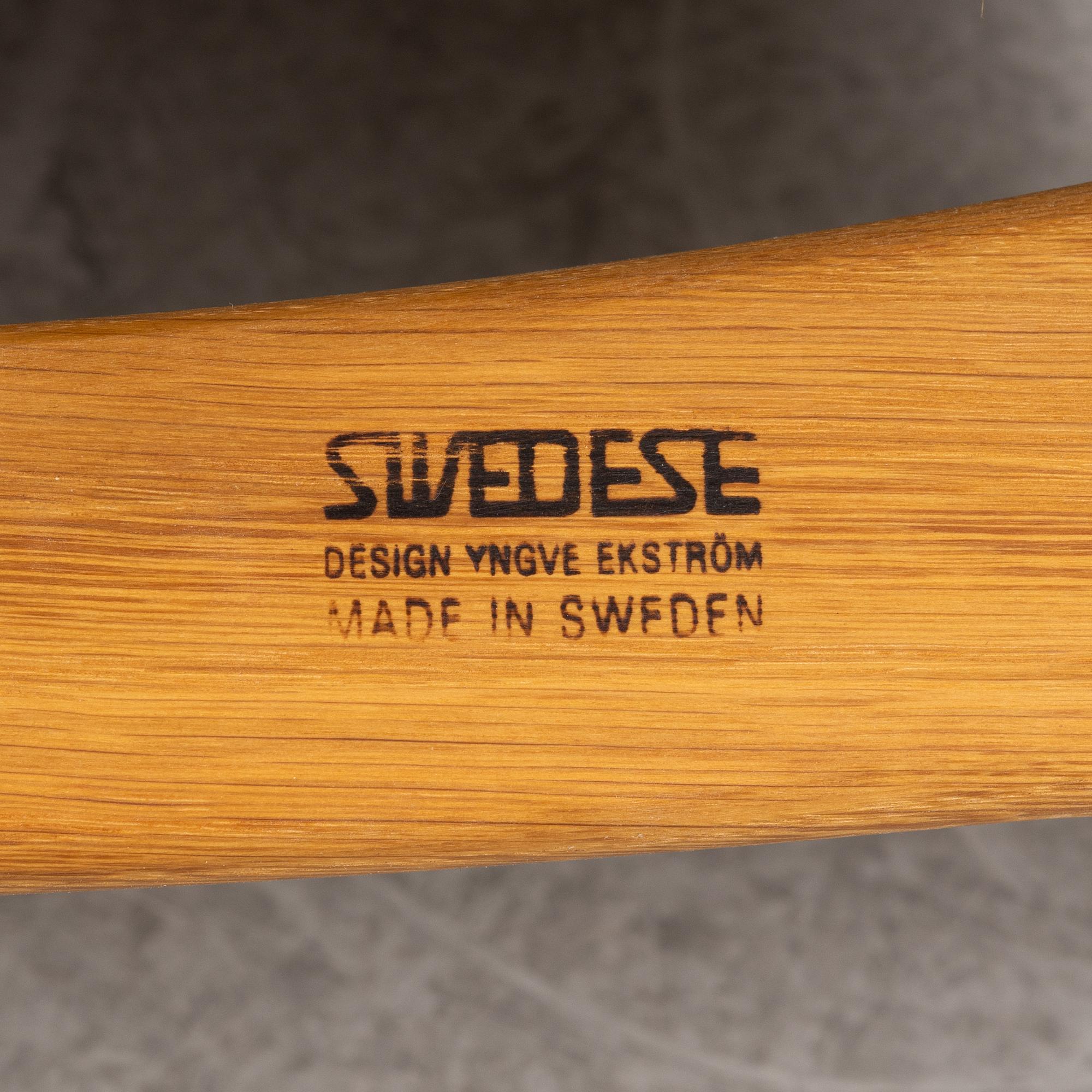 Yngve Ekström, a "Lamino" armchair with ottoman, Swedese, Sweden, late 20th century.