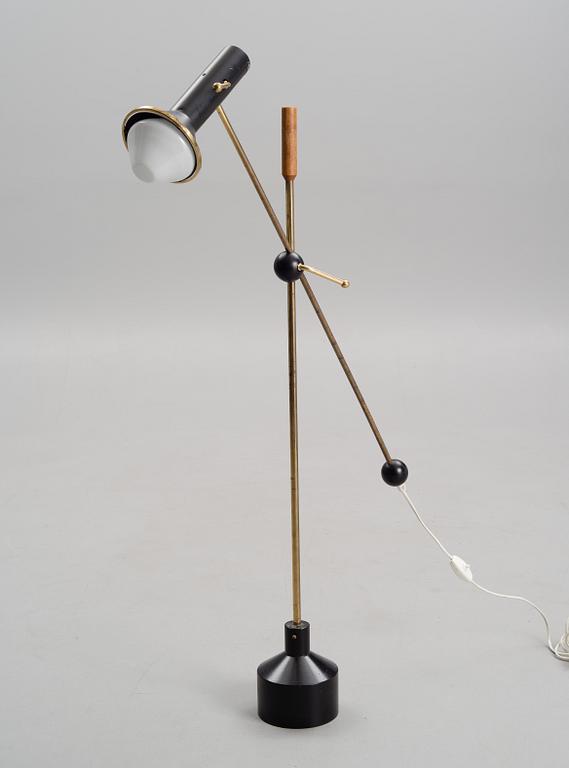 TAPIO WIRKKALA, ADJUSTABLE FLOOR LAMP. Designed 1958. Manufactured by Idman Oy.