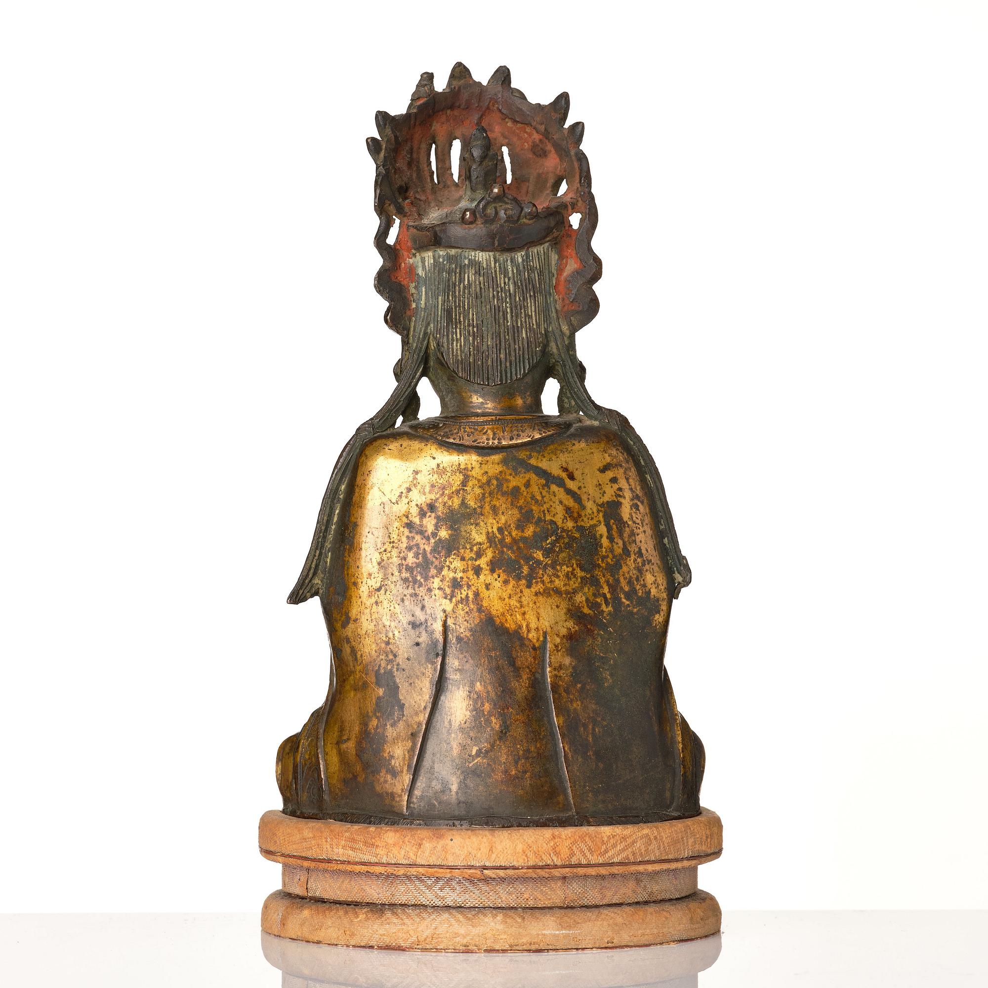 A gilt bronze figure of Guanyin, Ming dynasty, 16th/17th Century.