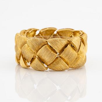 An 18K gold bracelet by Henry Dunay.
