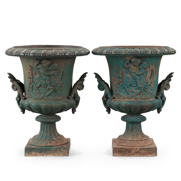 A pair of cast iron garden urns J&C G Bolinder No 24, around year 1900.