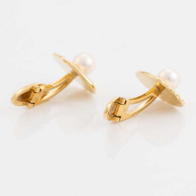 Ett par manschettknappar, Mikimoto, 18K guld med odlad pärla.