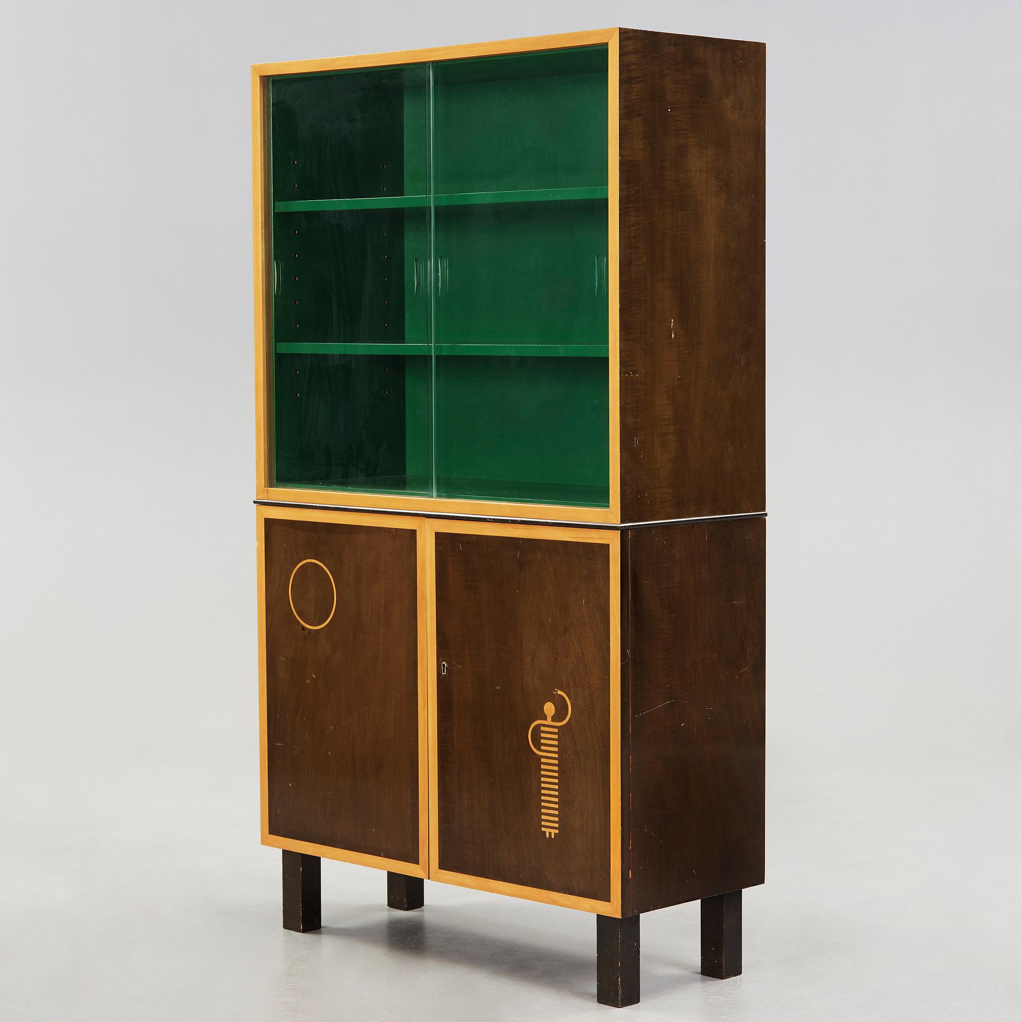 An Alvar Andersson vitrine cabinet 'Dansen' (The dance), executed by C.G.S Ericksson, Stockholm circa 1933.