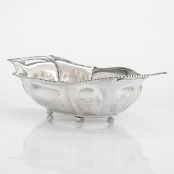 An early 20th-century silver bread basket, maker's mark of Hjalmar Fagerros, Helsinki 1911.