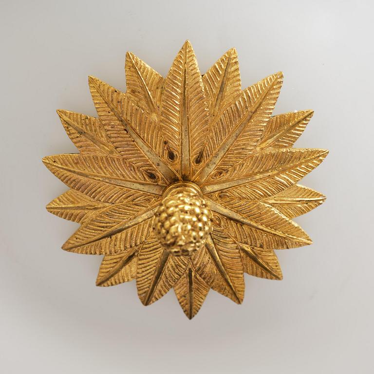 A late Gustavian gilt brass and cut glass four-light chandelier, Stockholm, late 18th century.