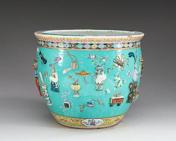 A large moulded famille rose fish basin, Qing dynasty, 19th Century.