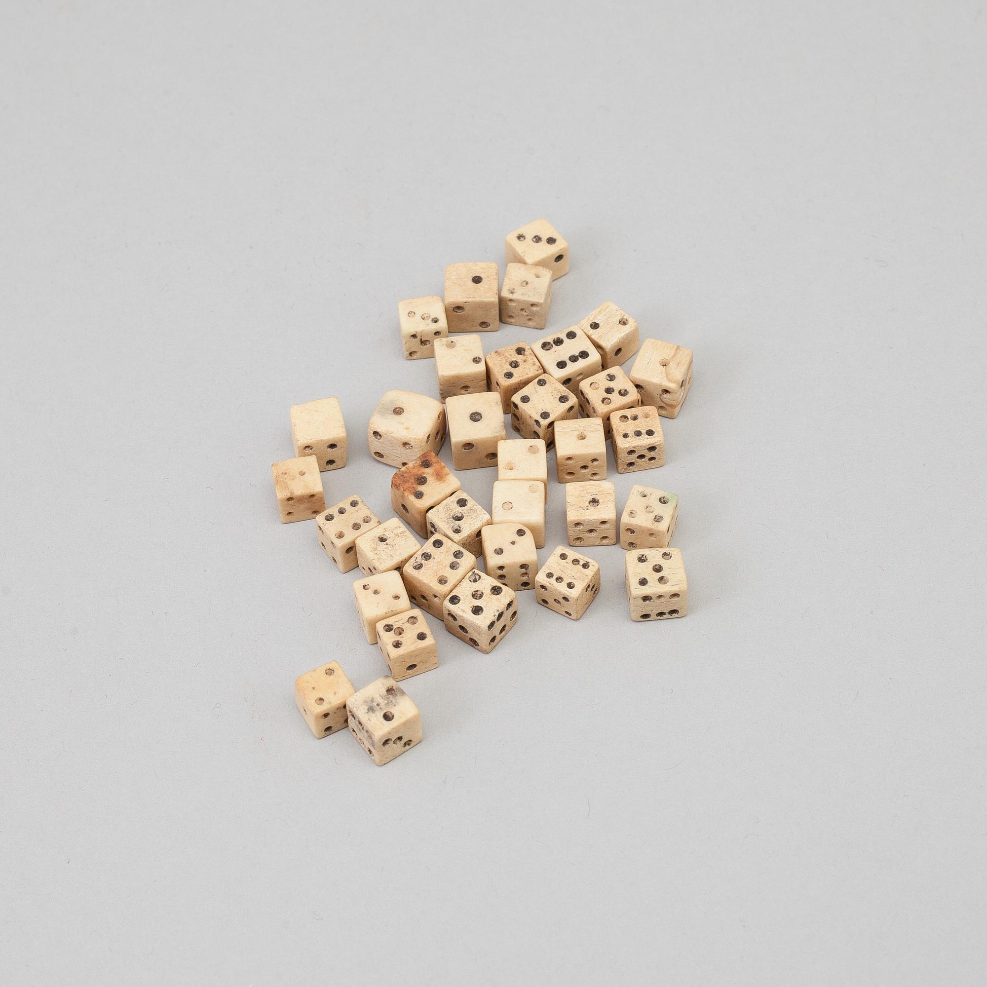 a collection of 34 miniature dice, bone, 19th century.