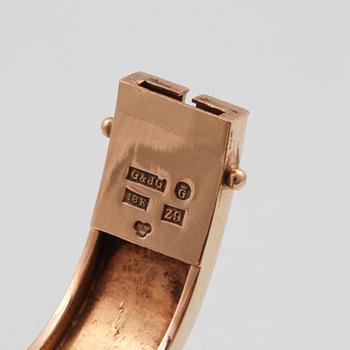 ARMRING, 18K guld, H G Baeckgård, Göteborg, 1974. Vikt 34,7 gram.