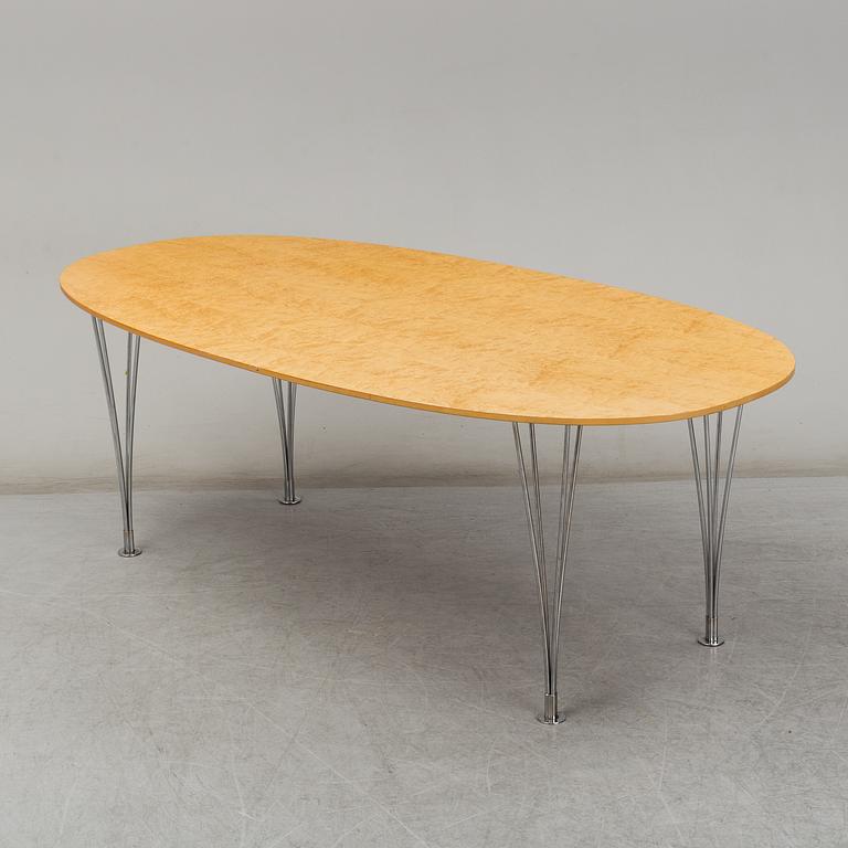 PIET HEIN & BRUNO MATHSSON, a curly birch veneered 'Superellips' table from Mathsson International.
