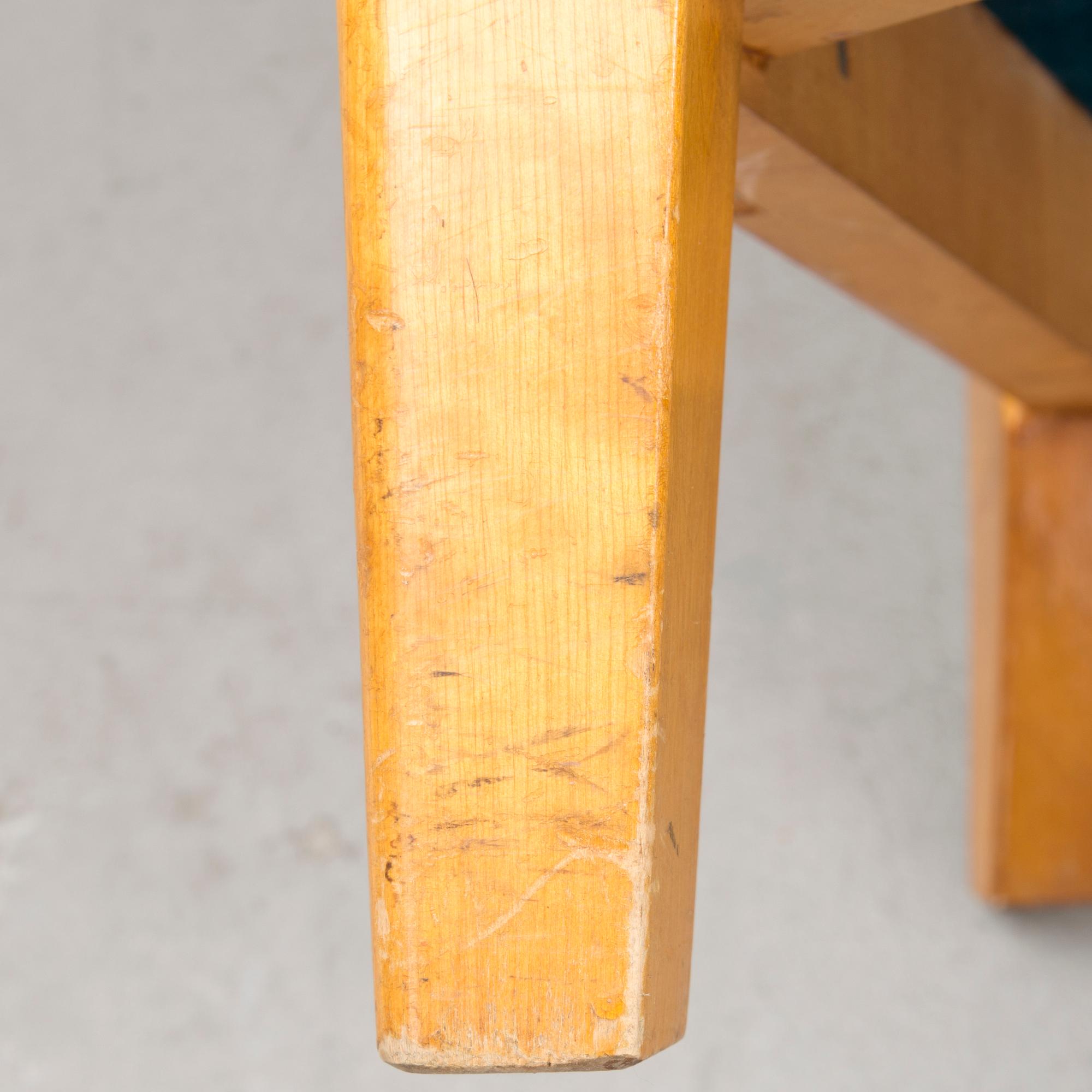 A pair of mid 20th century '2402 Armi' armchairs by Ilmari Lappalainen/Olavi Lieto, Asko, Finland.