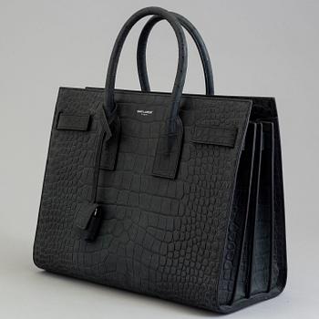 A bag by Yves Saint Laurent, "Sac du jour".