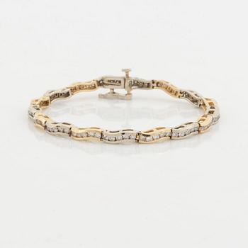 14K gold and brilliant cut diamond bracelet, with extra link.