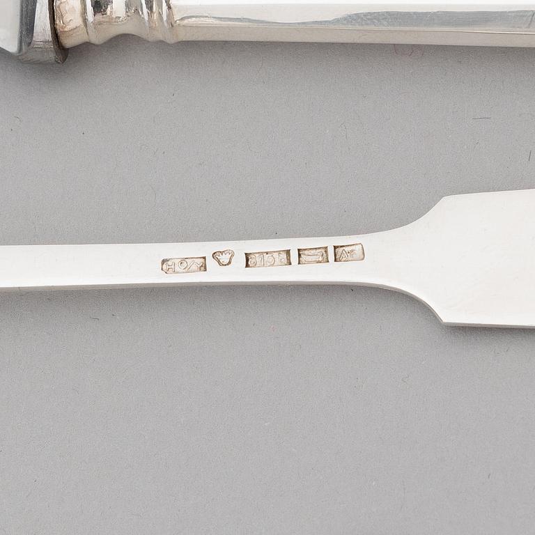 A 52-piece set of silver cutlery with seashell decoration, Finnish hallmarks 1922-1949.