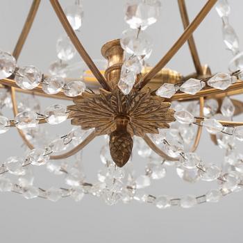 A pair of late Gustavian style chandeliers, 20th Century.