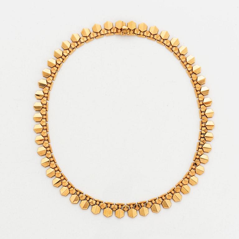 18K gold necklace.