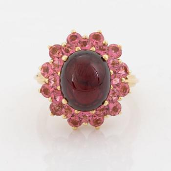 Pink sapphire and cabochon cut garnet ring.