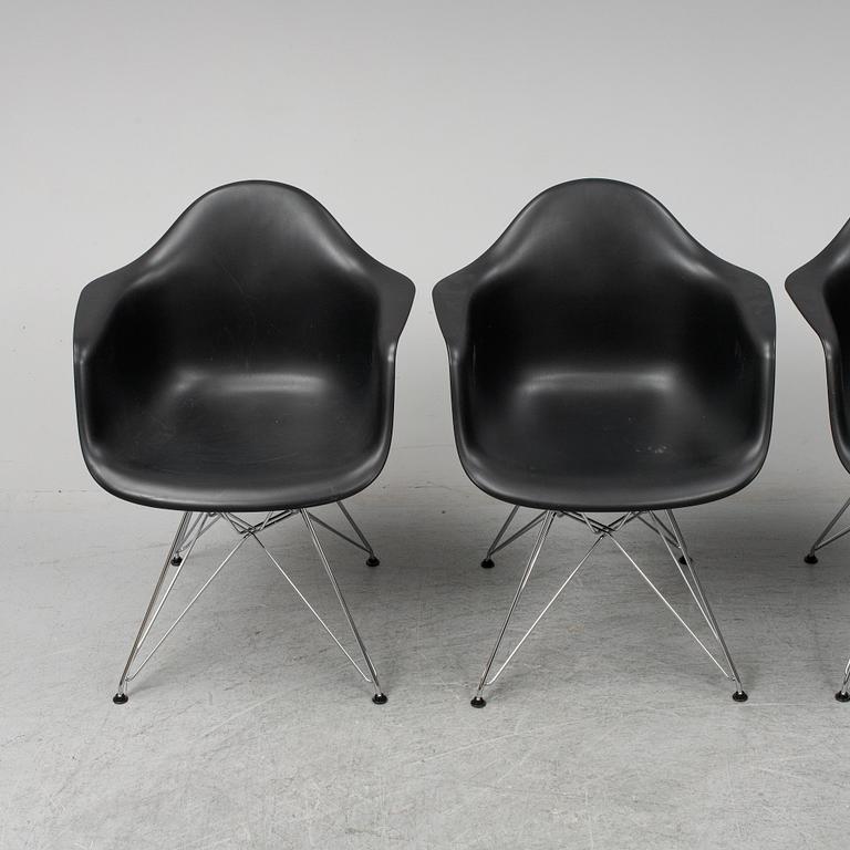 CHARLES AND RAY EAMES,  4  Eames Plastic Armchair, Vitra 2010.