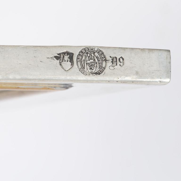 Firma Svenskt Tenn, a pewter and brass wall mirror model 2283, Firma Svenskt Tenn, Stockholm, 1952.