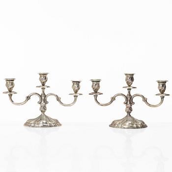 A pair of silver candelabra, Swedish import mark Adolf Landoff, Gothenburg 1931.
