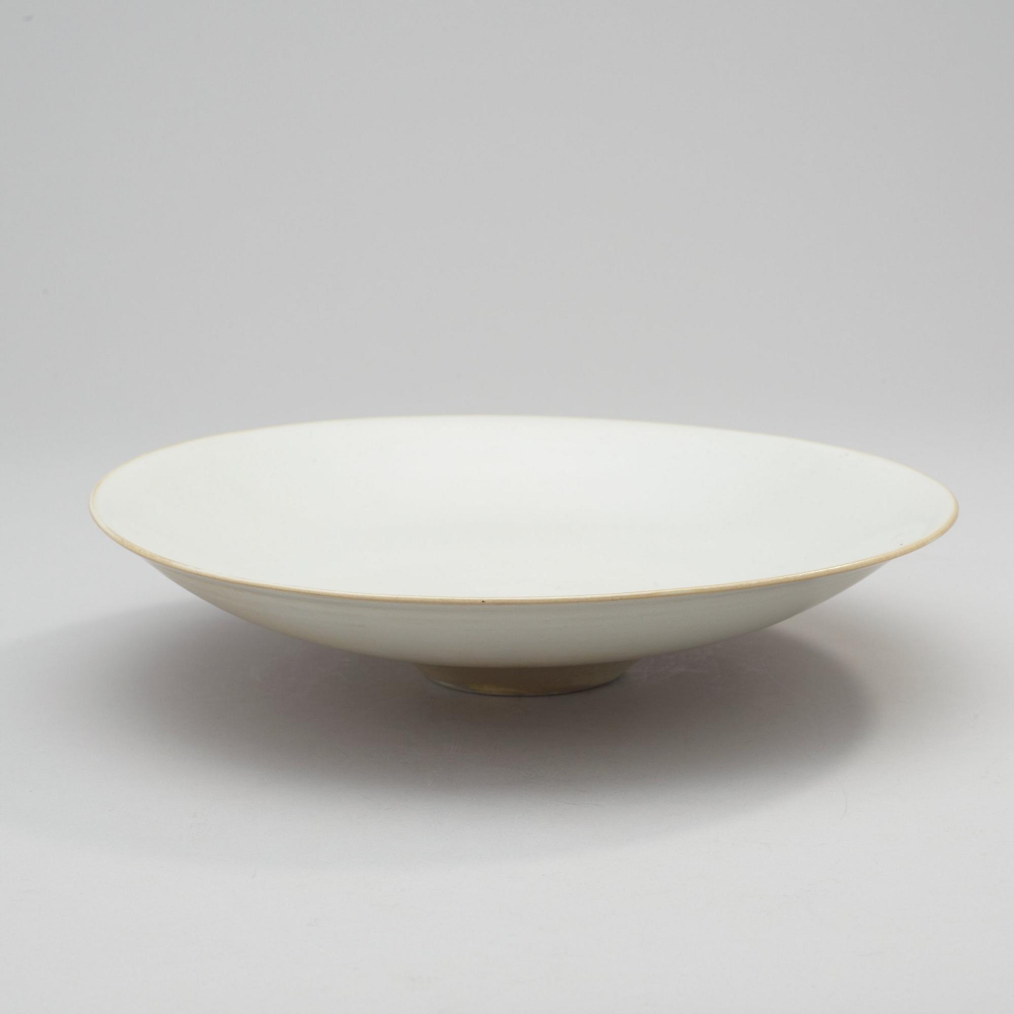 A Toini Muona stoneware dish, Arabia, Finland.