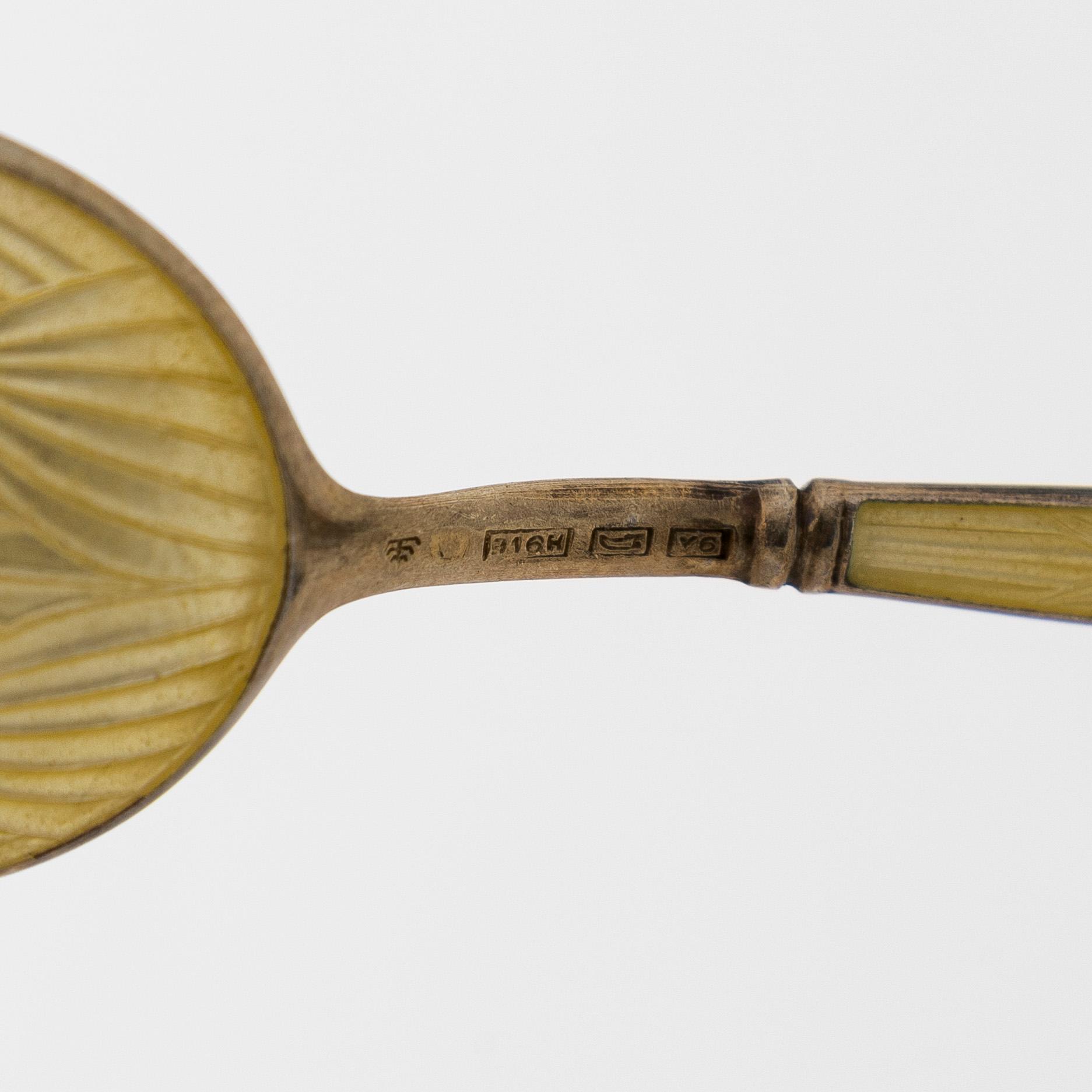 Tillander, a 10-piece set of enamelled and gilt silver coffee spoons, Helsinki.