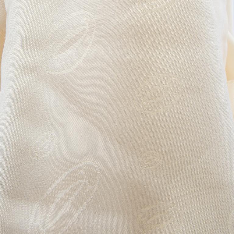 Cartier, a wool/silk scarf.