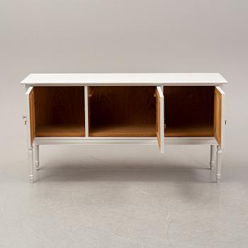 A painted Gustavian style sideboard, second half of the 20th Century.