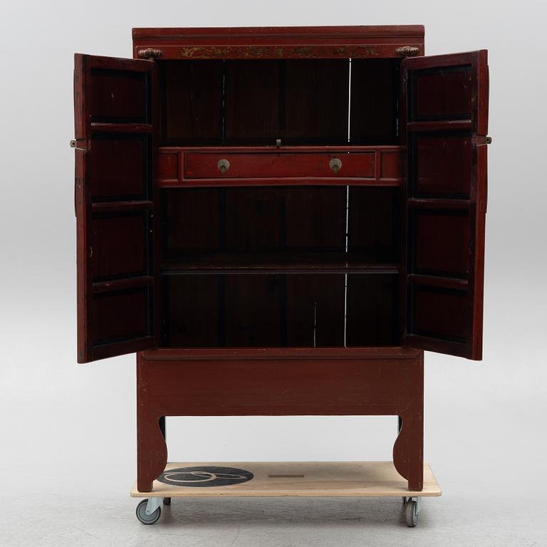 A 20th century cabinet, China.