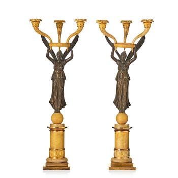 146. A pair of Empire ormolu and patinated bronze three-branch candelabra, possibly by R. F. Lindroth (1813-17).