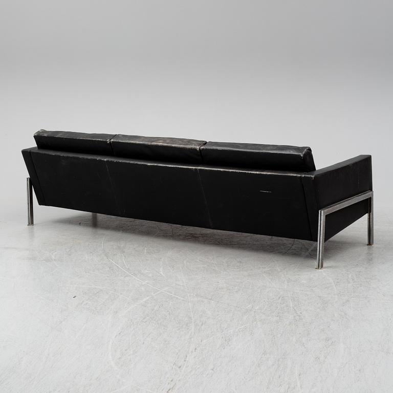 A 1960's leather covered sofa.