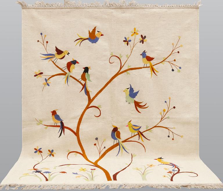An embroided oriental flat weave carpet, circa 225 x 175 cm.
