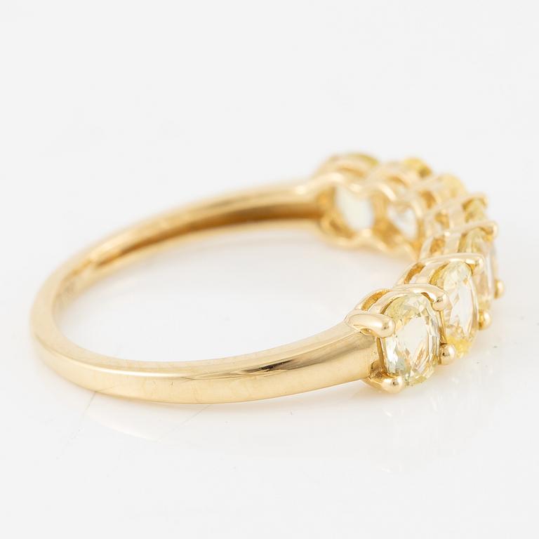 Ring, half eternity, 18K gold with yellow sapphires.