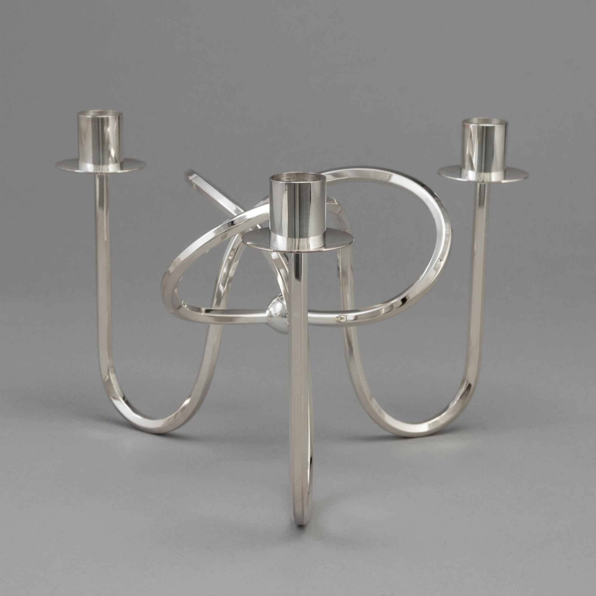 a silver platen "Vänskapsknuten" candelabra, Firma Svenskt Tenn, designed in 1938,