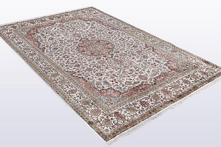 A carpet, silk Kashmir, ca 260 x 172 cm.