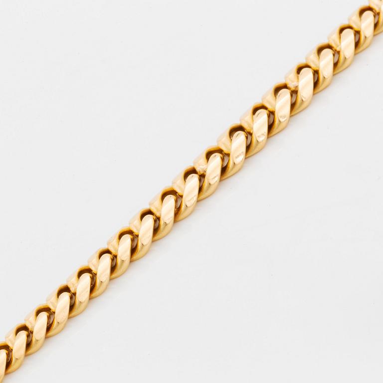 An 18K gold necklace by Jan Hellströmer.