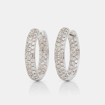 1183. A pair of oval hoop diamond earrings, 1.71 cts according to engraving.