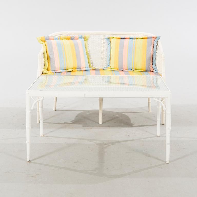 A late 20th century Miranda sofa and table.