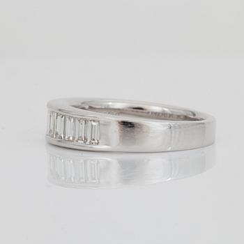 A baguette-cut diamond ring. Total diamond weight circa 0.80 ct.