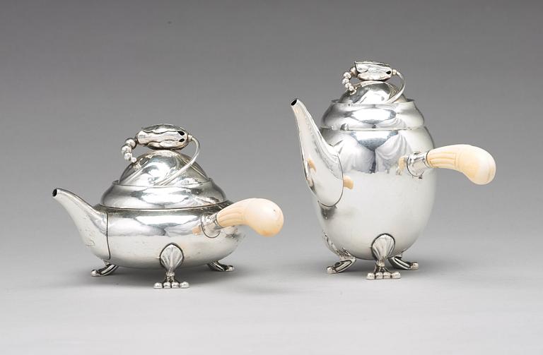 Georg Jensen, a four pieces of "Blossom" tea- and coffee set, Copenhagen 1918-1919, 830/1000 silver, design nr 2 and 100.